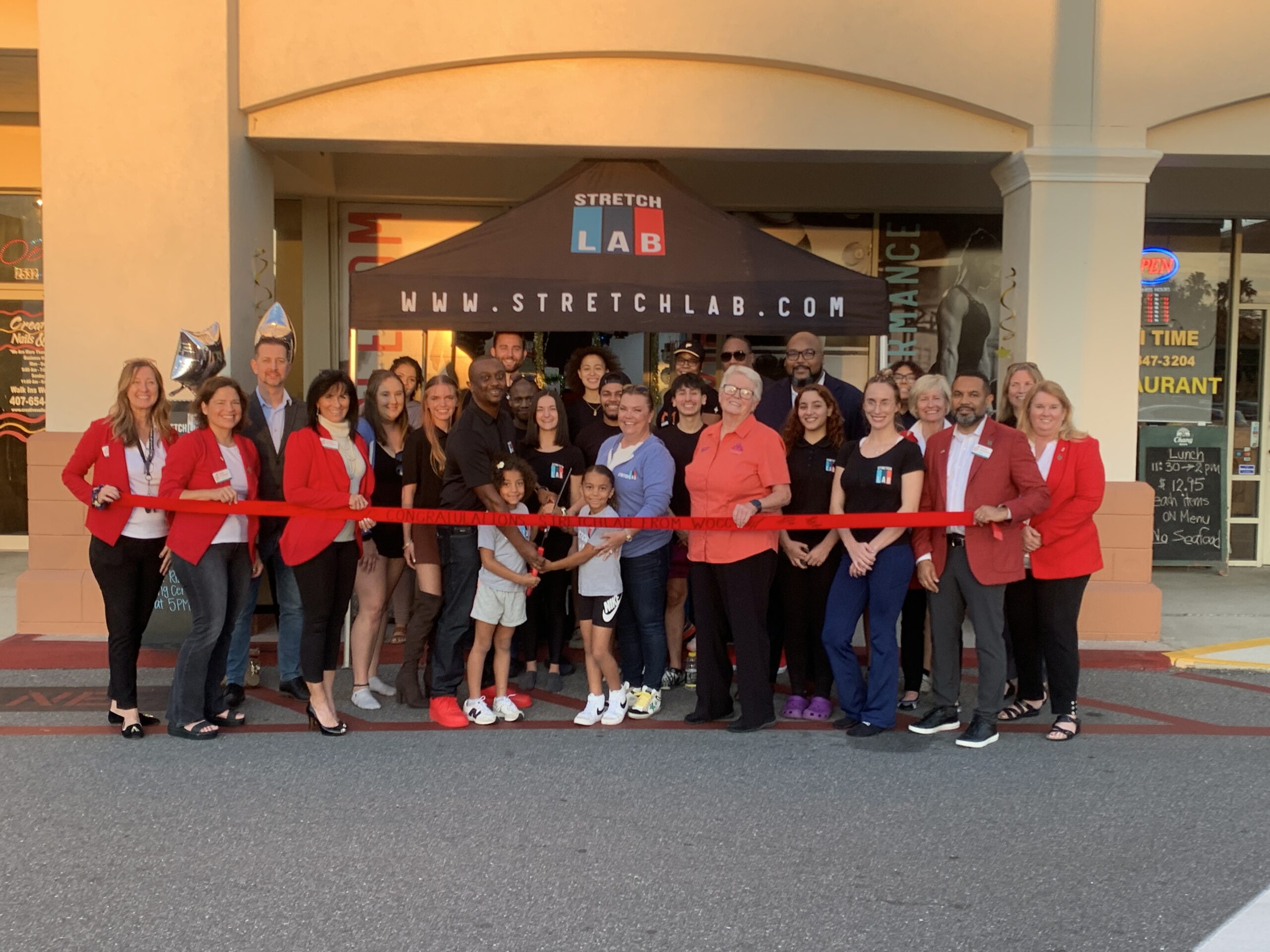 Tommy Hilfiger Ribbon Cutting  Orange County Chamber of Commerce